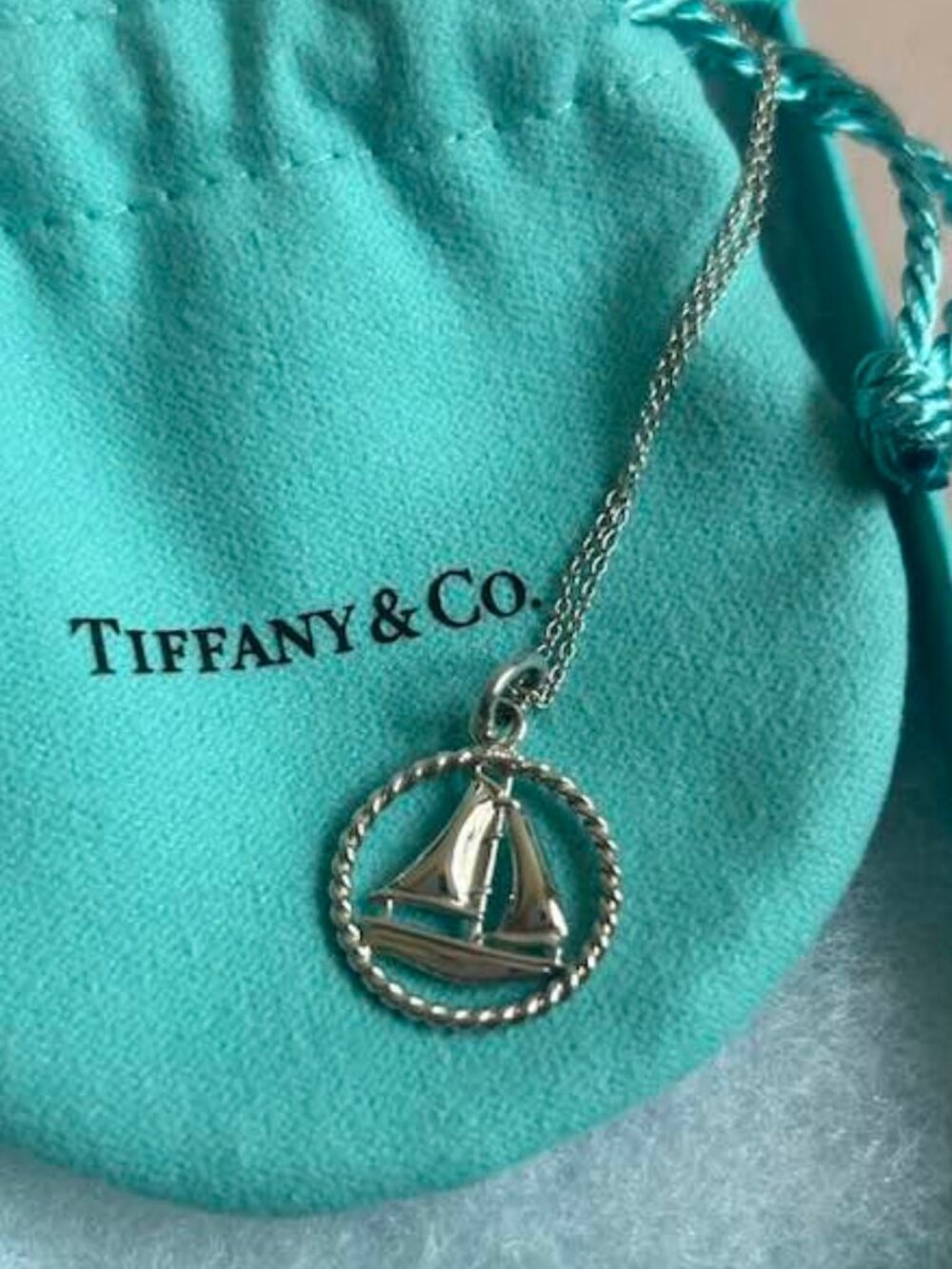 *Like New Condition! Tiffany & Co. Sterling Silver Twist Sailboat Charm Necklace